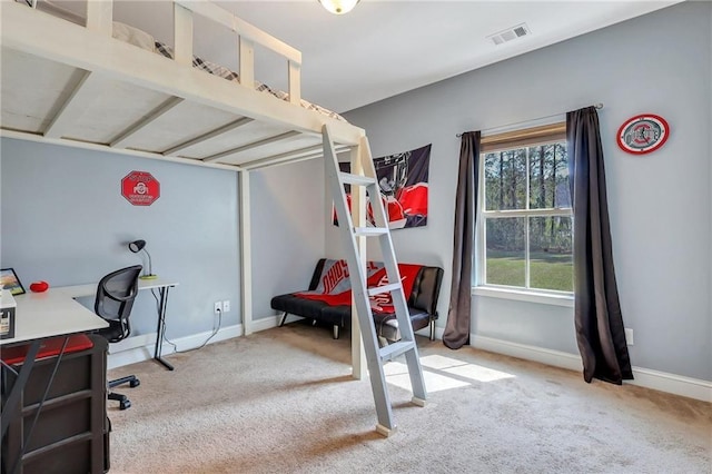 62 Wellington Cir, Brunswick, GA 31525 - carpeted bedroom featuring baseboards and a desk