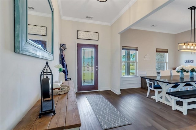 62 Wellington Cir, Brunswick, GA 31525 - entryway with dark wood-style floors and crown molding