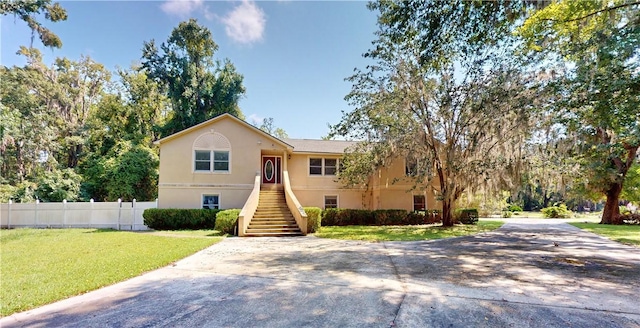 view of front of property with a front lawn