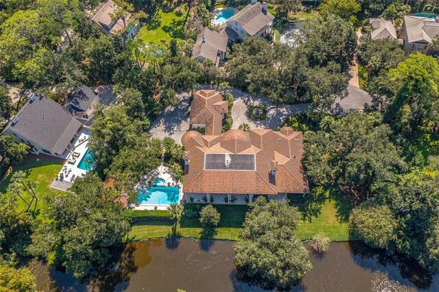 birds eye view of property featuring a water view