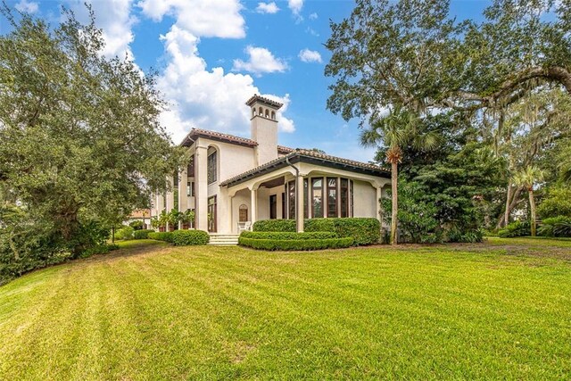 exterior space with a lawn