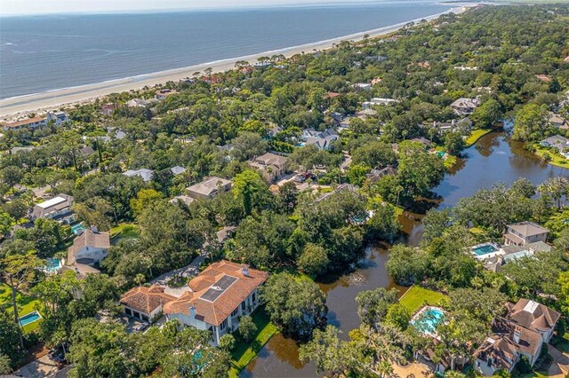 aerial view with a view of the beach and a water view