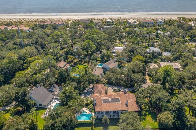 aerial view featuring a water view and a beach view