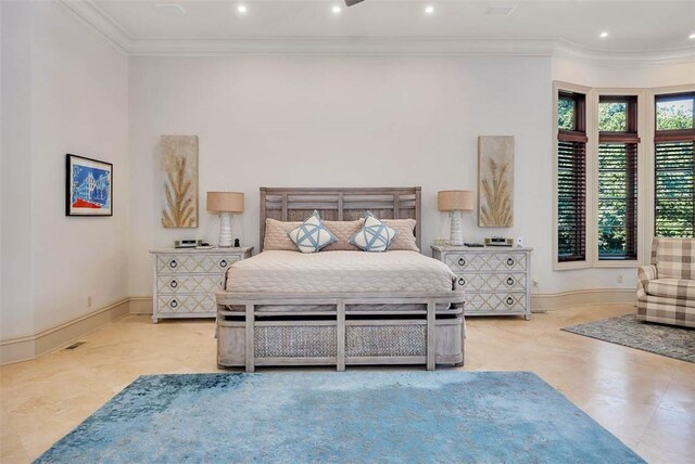 bedroom featuring crown molding