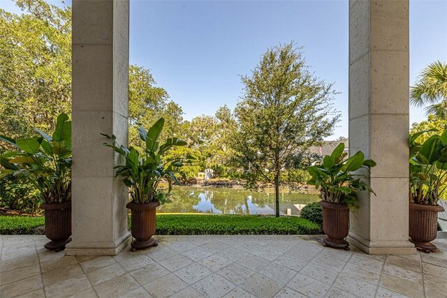 view of patio / terrace featuring a water view