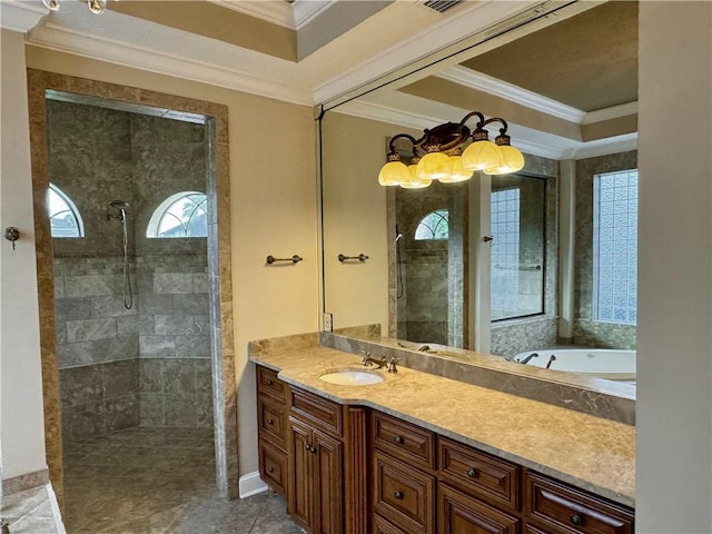 bathroom featuring a tile shower, crown molding, tile patterned floors, and vanity