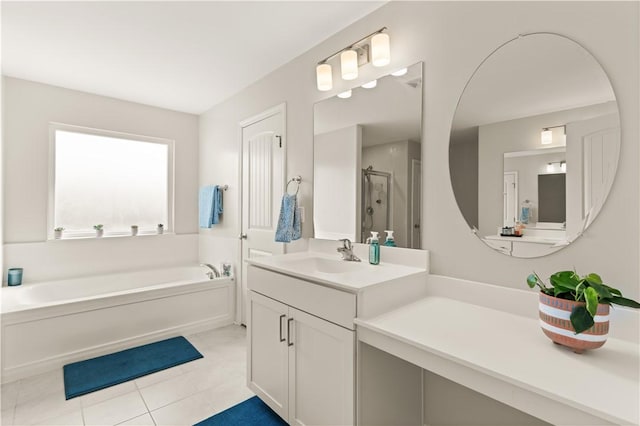 288 Chestnut Dr, Brunswick, GA 31523 - bathroom with a garden tub, vanity, a shower stall, and tile patterned floors