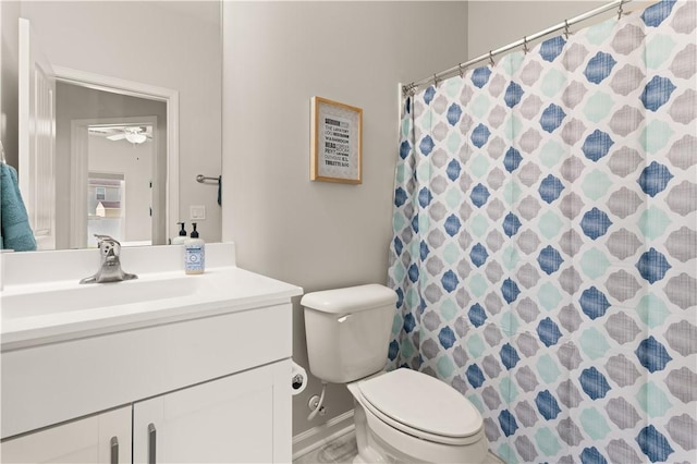 288 Chestnut Dr, Brunswick, GA 31523 - bathroom featuring vanity, a ceiling fan, and a shower with curtain