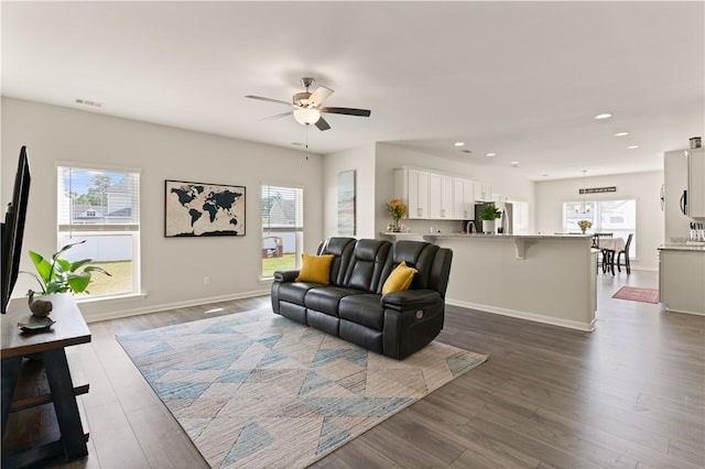 288 Chestnut Dr, Brunswick, GA 31523 - living area with healthy amount of natural light, recessed lighting, a ceiling fan, and dark wood-style floors
