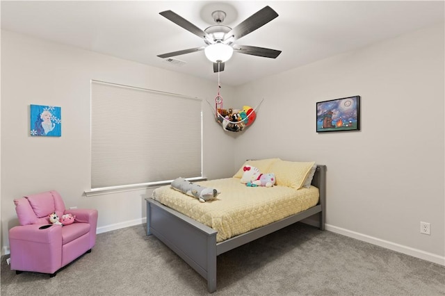 288 Chestnut Dr, Brunswick, GA 31523 - carpeted bedroom with baseboards and a ceiling fan