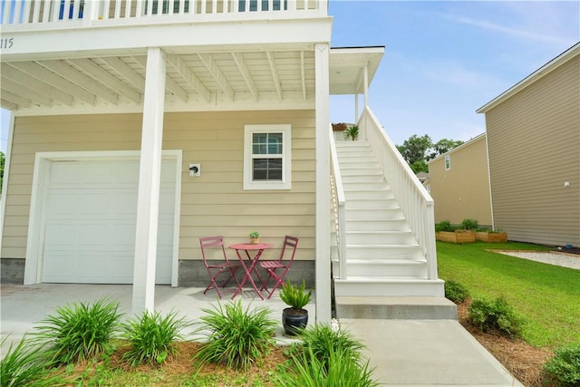 doorway to property featuring an attached garage