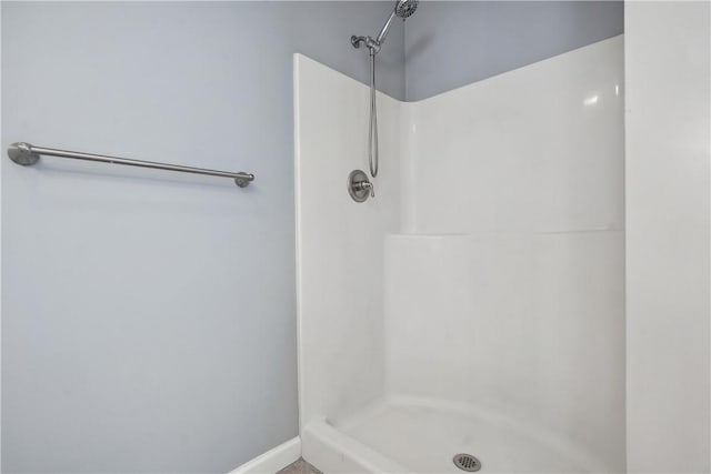 bathroom featuring walk in shower