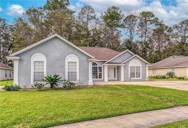 ranch-style house with a front yard