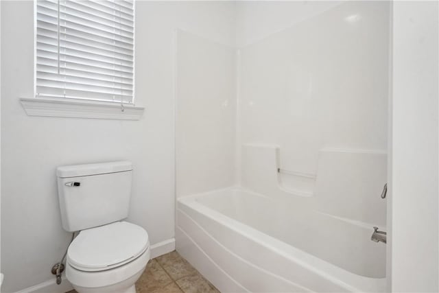 bathroom featuring tile patterned flooring and toilet