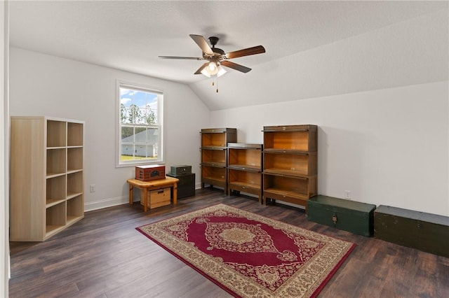 additional living space with ceiling fan, dark hardwood / wood-style flooring, and lofted ceiling