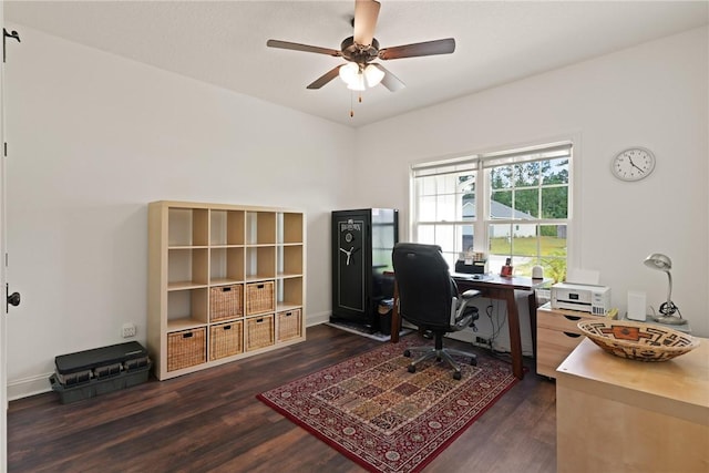 office with dark hardwood / wood-style floors and ceiling fan