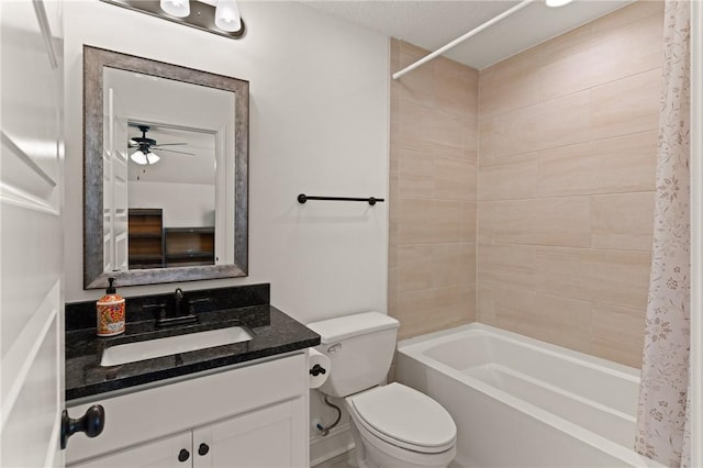 full bathroom featuring shower / bathtub combination with curtain, ceiling fan, vanity, and toilet