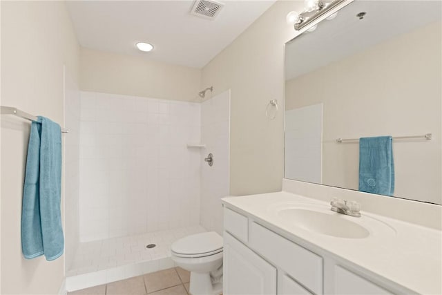 91 Screven St, Darien, GA 31305 - full bathroom featuring vanity, tiled shower, and tile patterned floors