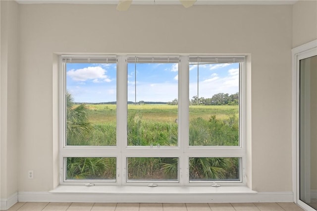 91 Screven St, Darien, GA 31305 - empty room featuring tile patterned flooring and healthy amount of natural light