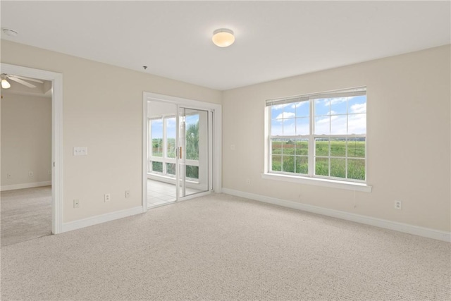 91 Screven St, Darien, GA 31305 - unfurnished room with carpet and a ceiling fan