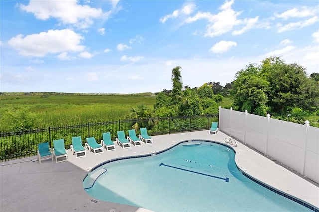 91 Screven St, Darien, GA 31305 - community pool featuring a patio area