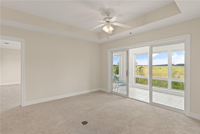 91 Screven St, Darien, GA 31305 - carpeted spare room with ceiling fan and a raised ceiling