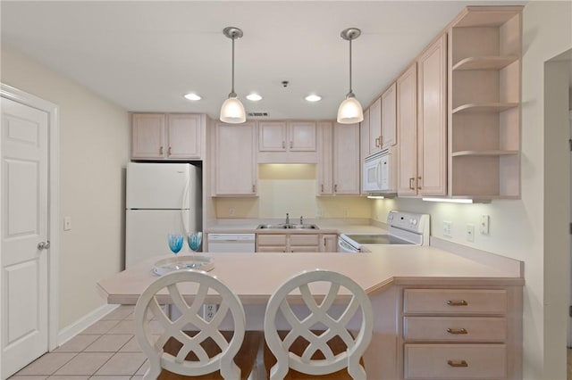 91 Screven St, Darien, GA 31305 - kitchen featuring white appliances, light countertops, open shelves, light tile patterned floors, and recessed lighting