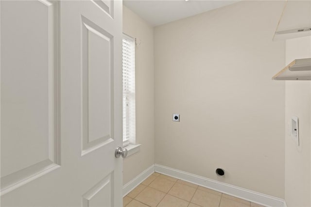 91 Screven St, Darien, GA 31305 - washroom featuring hookup for an electric dryer and light tile patterned flooring