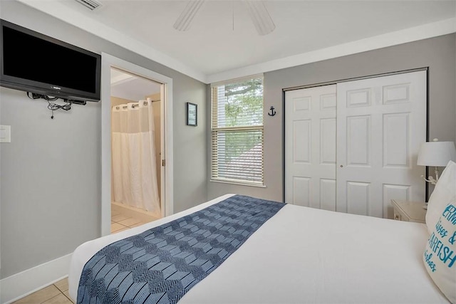 1175 N Beachview Dr Unit 414, Jekyll Island, GA 31527 - tiled bedroom with a closet, baseboards, and ceiling fan