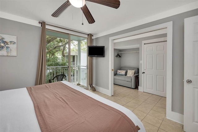 1175 N Beachview Dr Unit 414, Jekyll Island, GA 31527 - bedroom with light tile patterned floors, baseboards, ceiling fan, and a closet