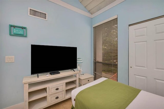 1175 N Beachview Dr Unit 414, Jekyll Island, GA 31527 - tiled bedroom featuring lofted ceiling