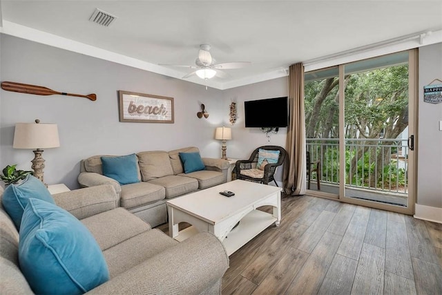1175 N Beachview Dr Unit 414, Jekyll Island, GA 31527 - living area with wood finished floors and a ceiling fan