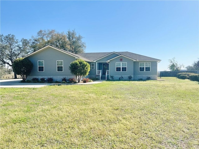 ranch-style house with a front lawn