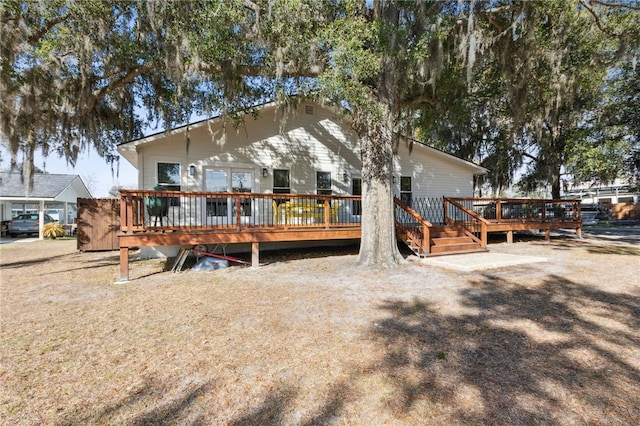208 Bishop Cir, Saint Marys, GA 31558 - rear view of property with a wooden deck