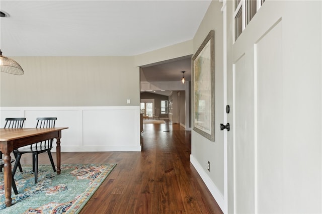 208 Bishop Cir, Saint Marys, GA 31558 - hallway with dark wood-style flooring and wainscoting