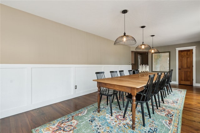 208 Bishop Cir, Saint Marys, GA 31558 - dining area with a decorative wall, dark wood-type flooring, and a wainscoted wall
