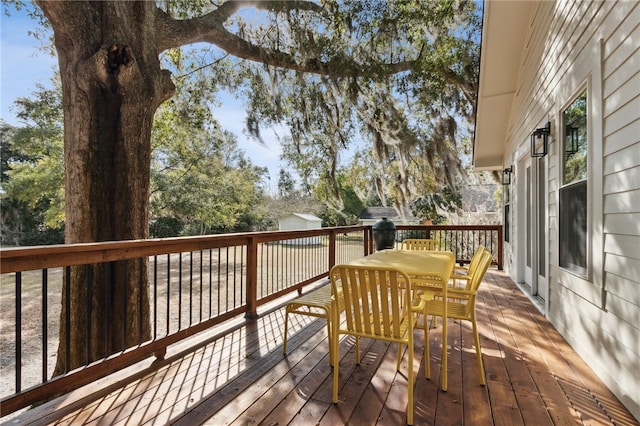 208 Bishop Cir, Saint Marys, GA 31558 - wooden deck featuring outdoor dining area
