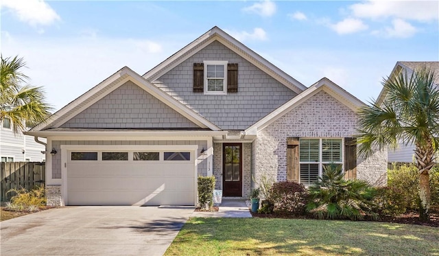 view of front facade with a garage and a front lawn