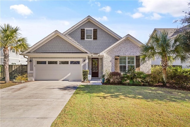 view of front of property with a garage and a front lawn