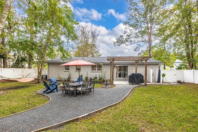 back of house featuring a pergola, a lawn, cooling unit, and a patio