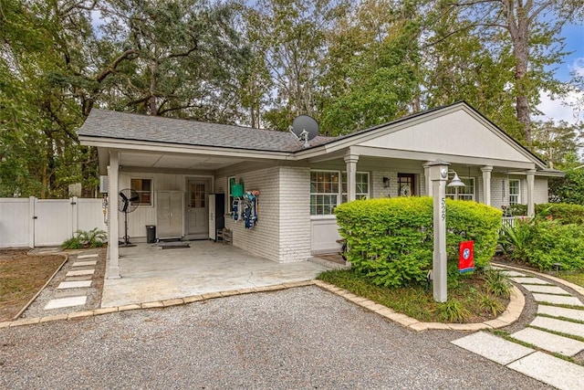 view of front facade featuring a carport