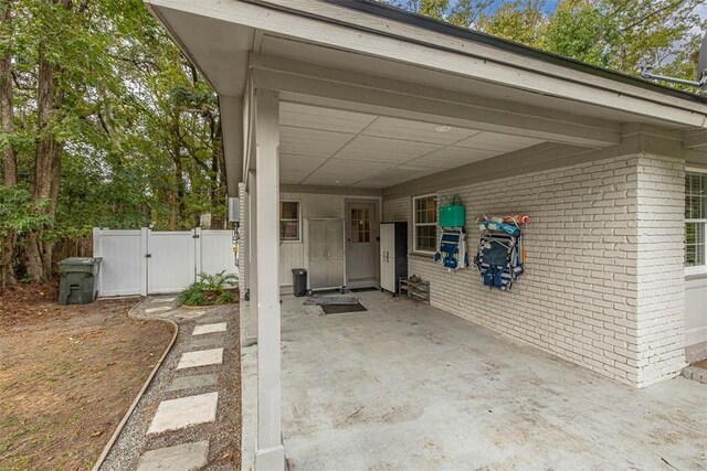 rear view of property with a yard and a patio