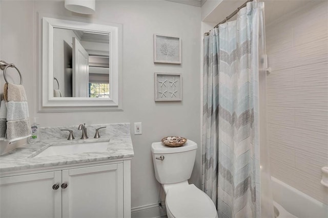 full bathroom featuring shower / bath combination with curtain, vanity, toilet, and ornamental molding