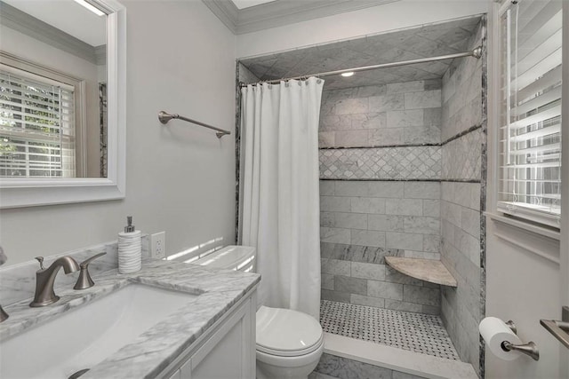 bathroom with crown molding, toilet, and walk in shower