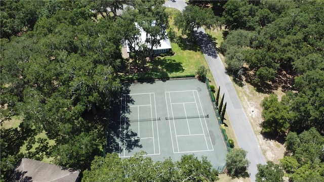 view of sport court with fence