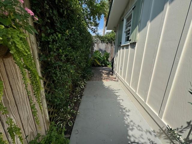 view of property exterior featuring a patio area