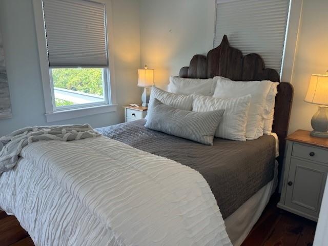 bedroom featuring dark hardwood / wood-style floors