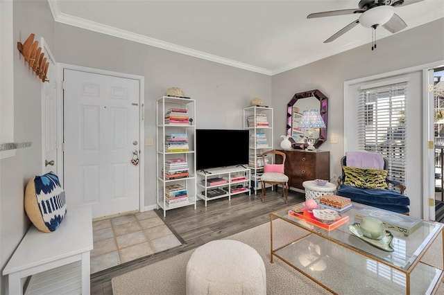 living room featuring crown molding, ceiling fan, and hardwood / wood-style floors