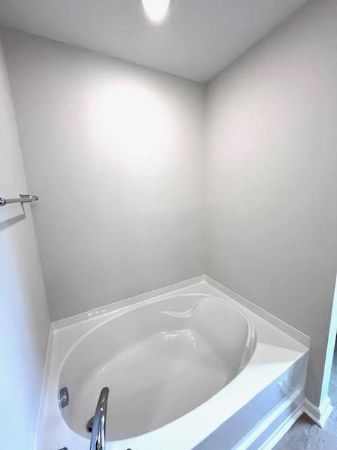 full bath featuring a garden tub