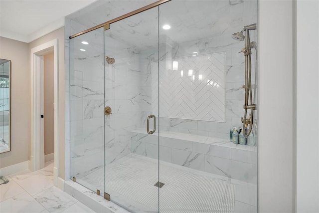 bathroom featuring an enclosed shower